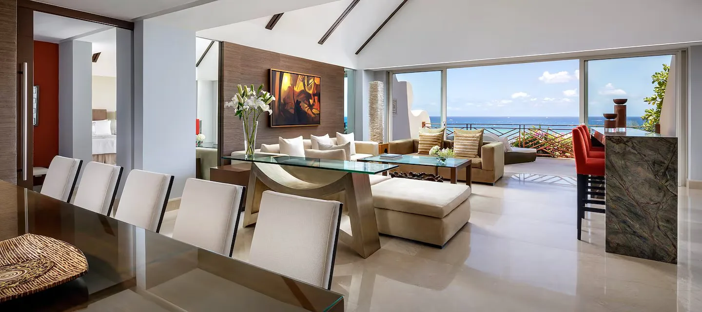 Suite Garden View at Grand Velas Riviera Maya with elegant living area, lush garden views, and signature Grand Velas luxury amenities.