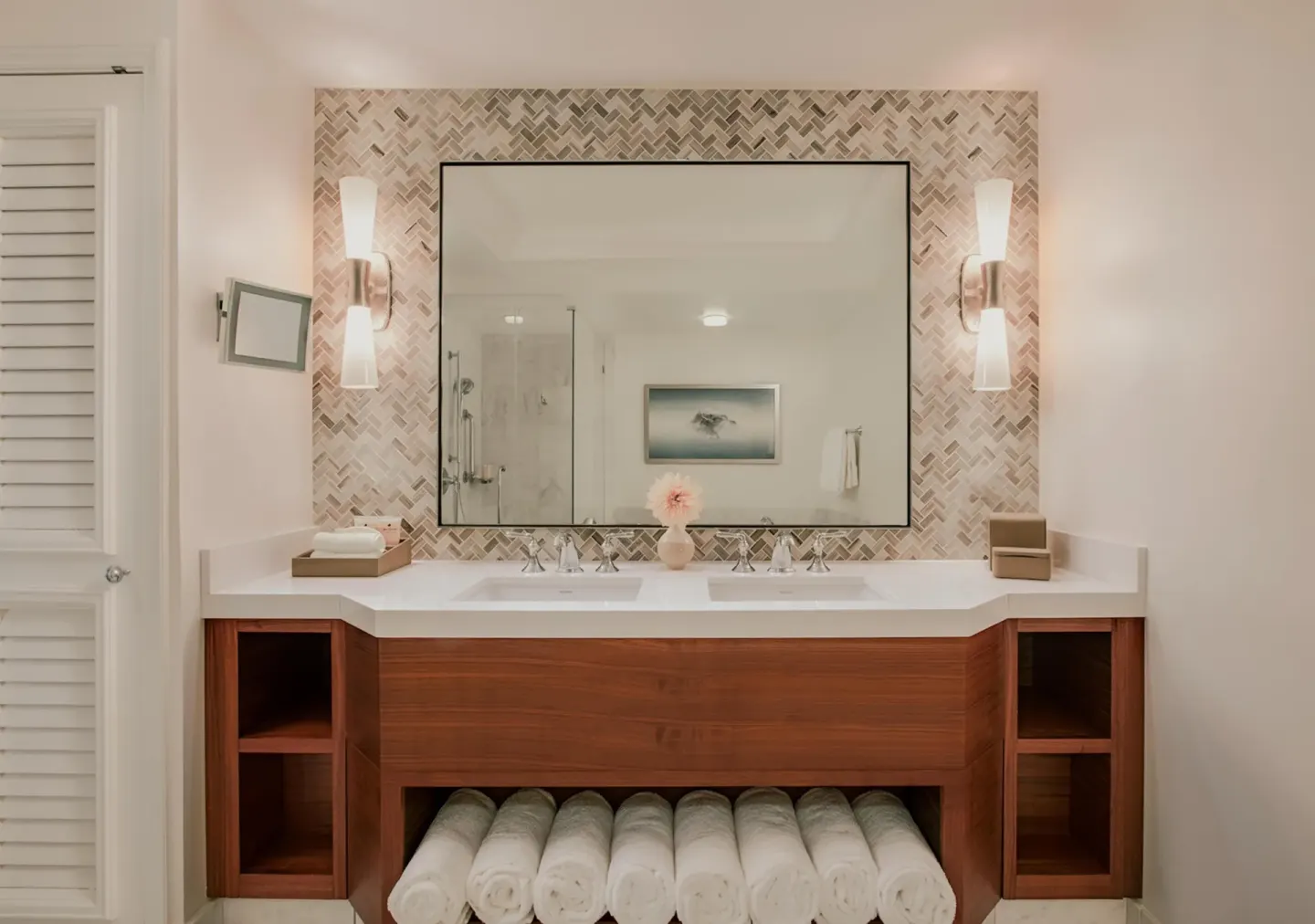 Club Suite bathroom vanity with two sinks and rolled towels at Grand Wailea Maui.