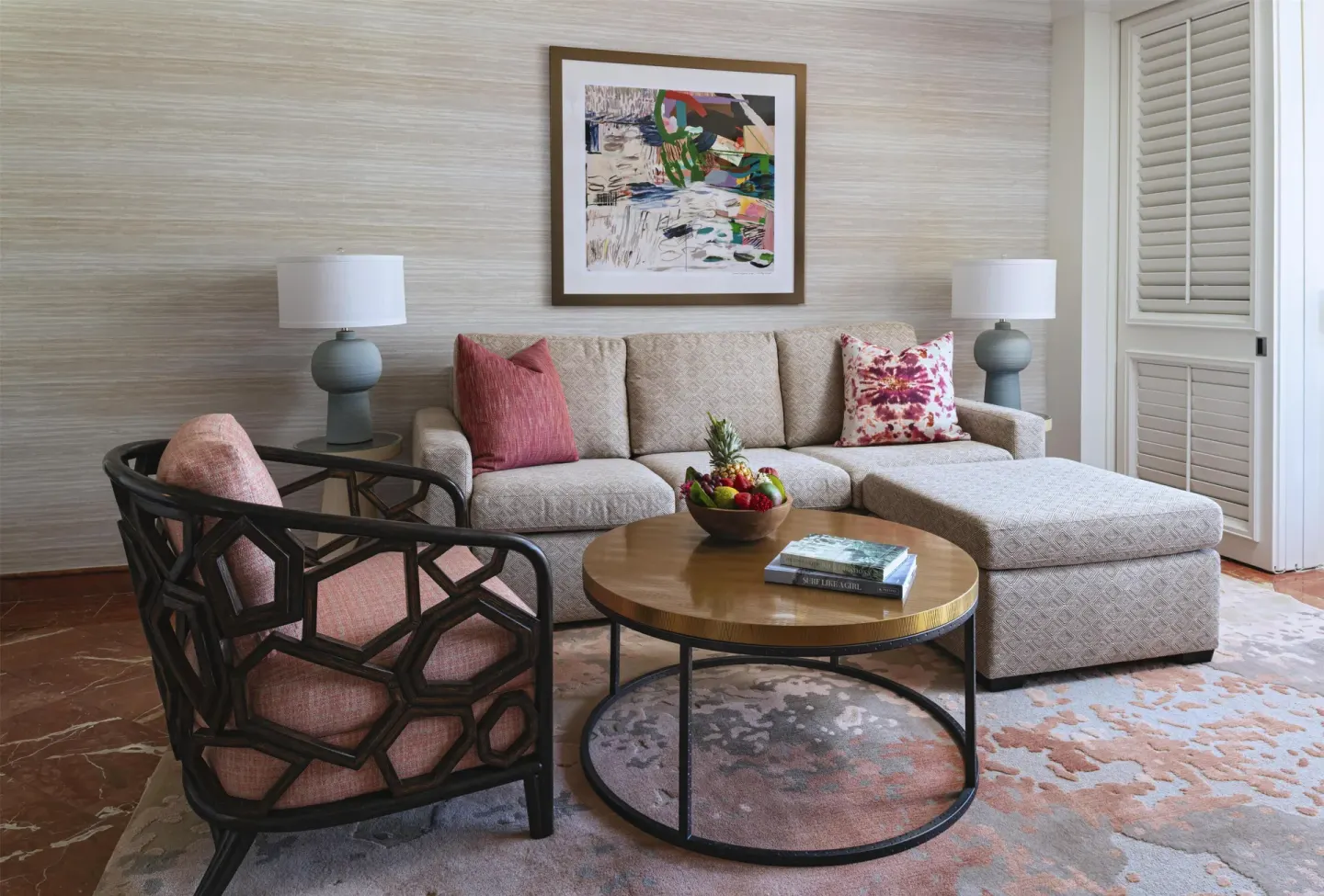 Club Suite seating area with chaise sofa, armchair, and coffee table at Grand Wailea Maui.