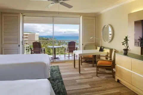 Deluxe Room Ocean View with two beds and balcony at Grand Wailea Maui.