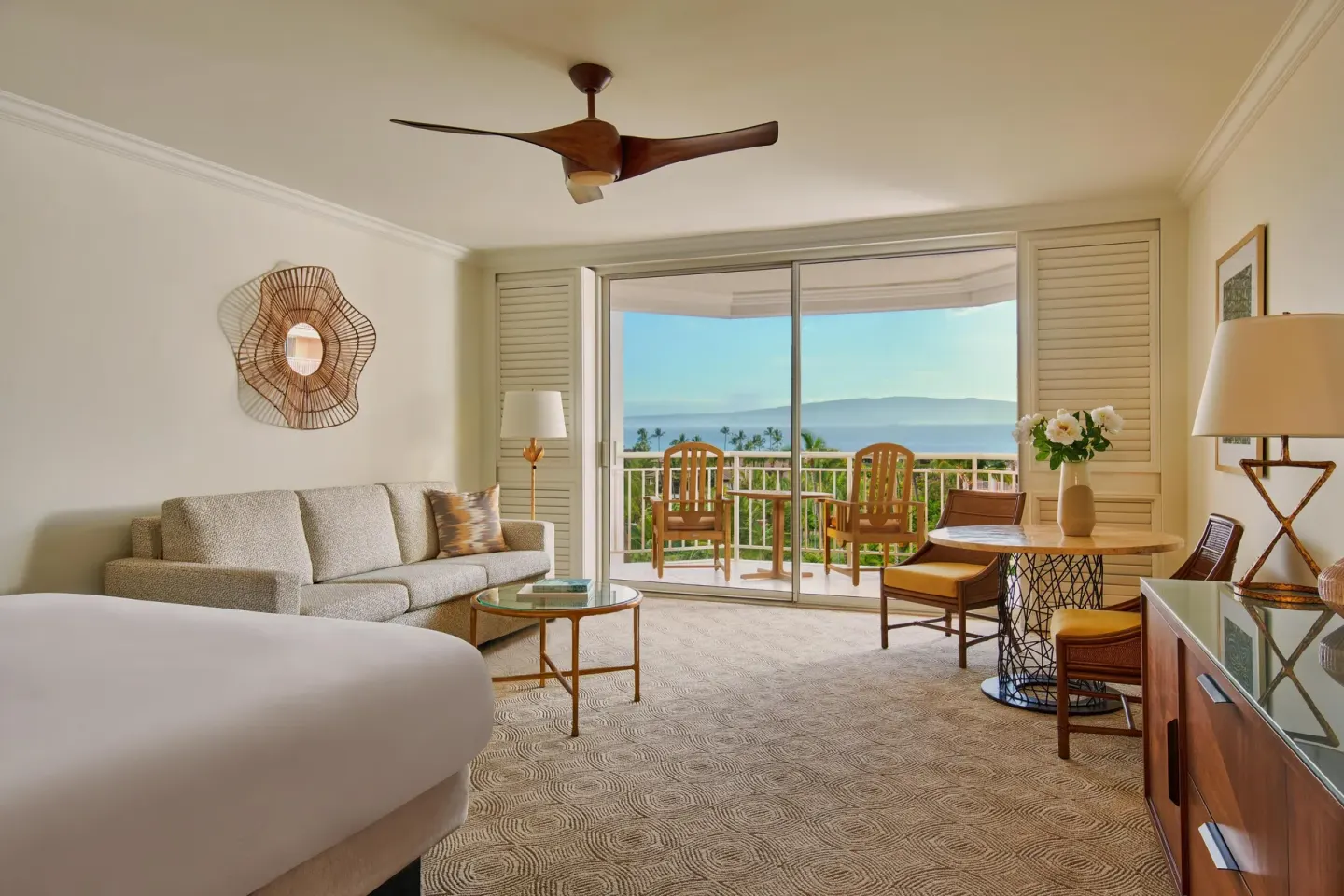 Deluxe ocean-view room with sofa bed and balcony at Grand Wailea Maui.
