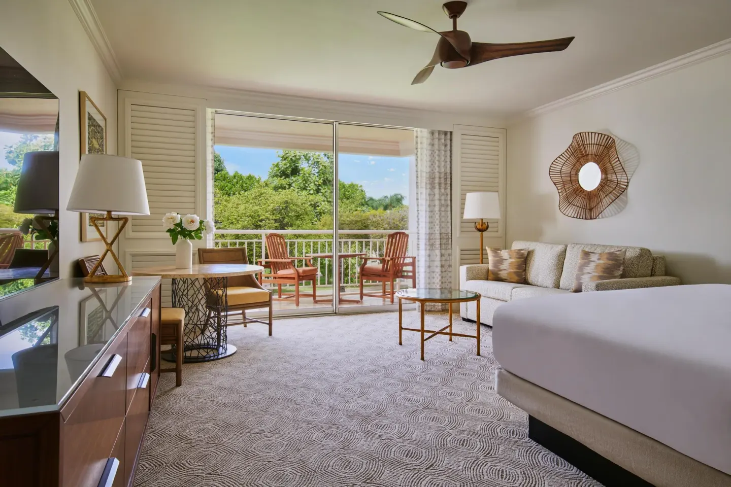 Deluxe accessible garden view room with king bed and sofa bed at Grand Wailea Maui.
