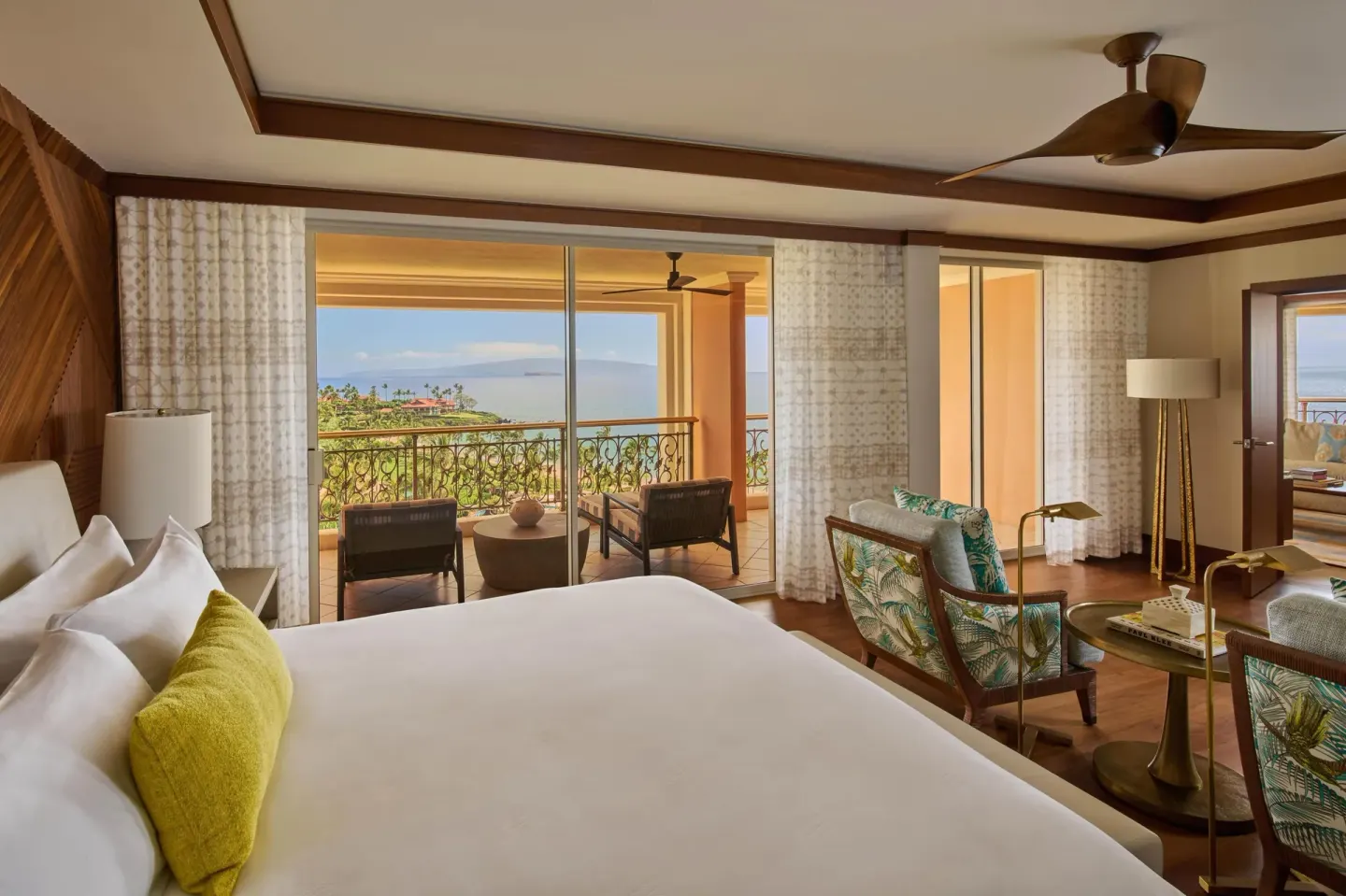 Ocean-view bedroom and balcony in a Grand Suite at Grand Wailea Maui.