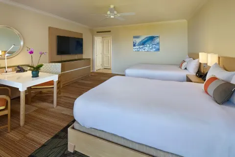 Accessible garden view room with two queen beds and desk at Grand Wailea Maui.