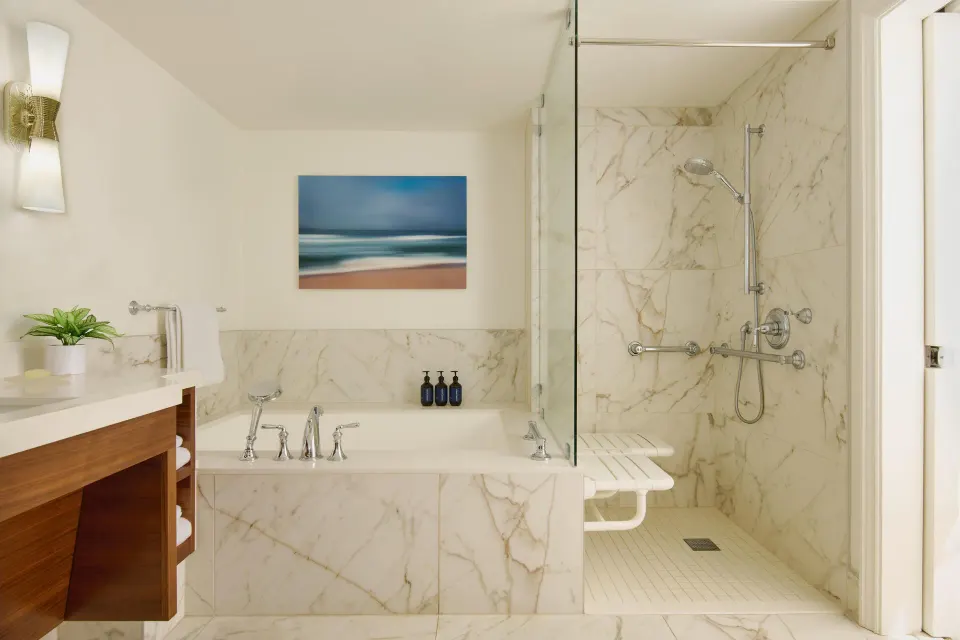 Accessible bathroom with transfer shower and soaking tub at Grand Wailea Maui.