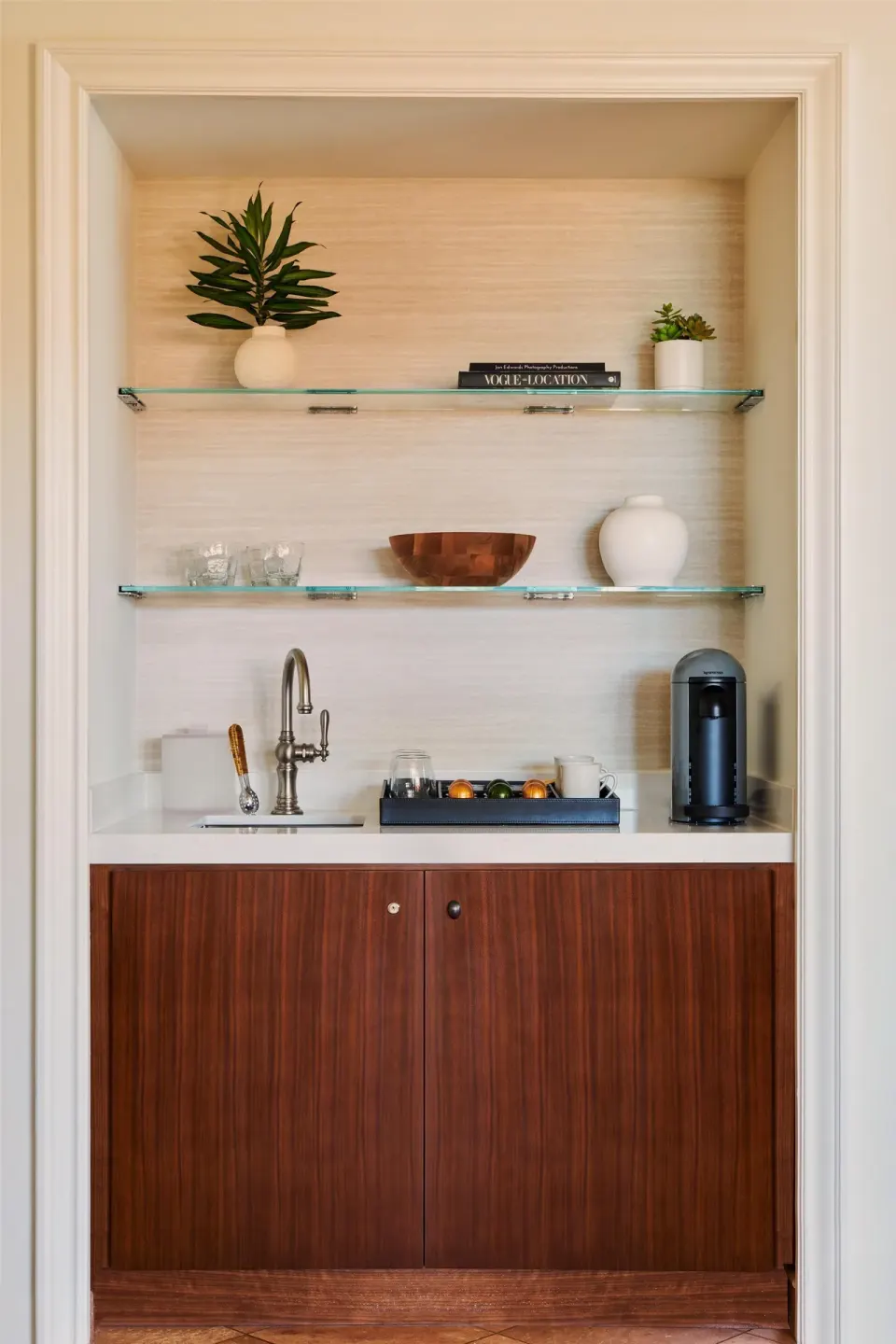 Wet bar in a one-bedroom garden view suite at Grand Wailea Maui with sink, shelves, and coffee maker.
