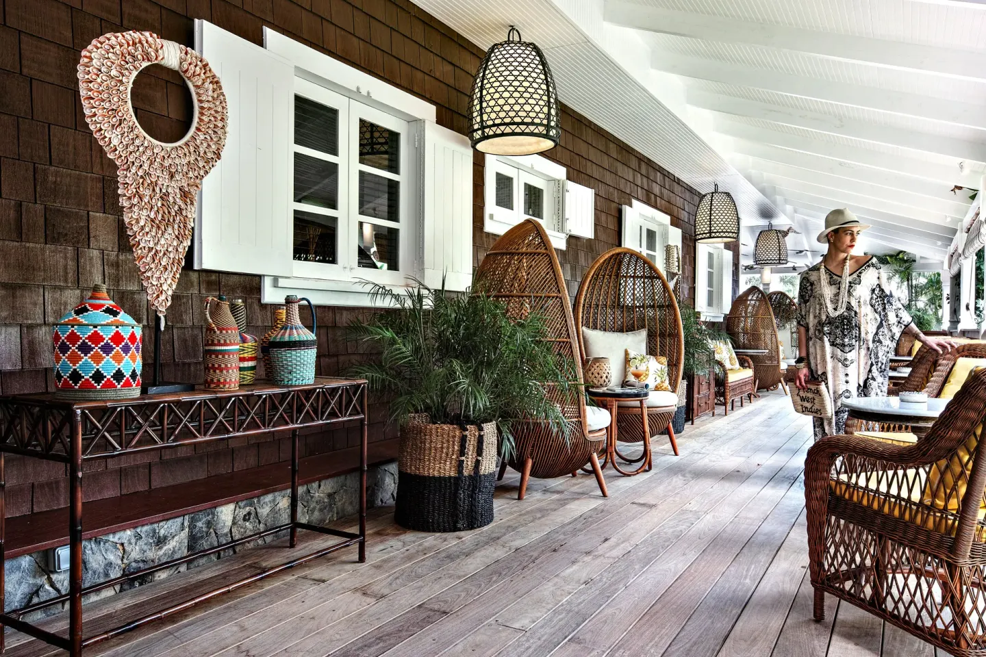 Covered veranda with wicker chairs and tropical decor at GYP SEA Saint Barth.