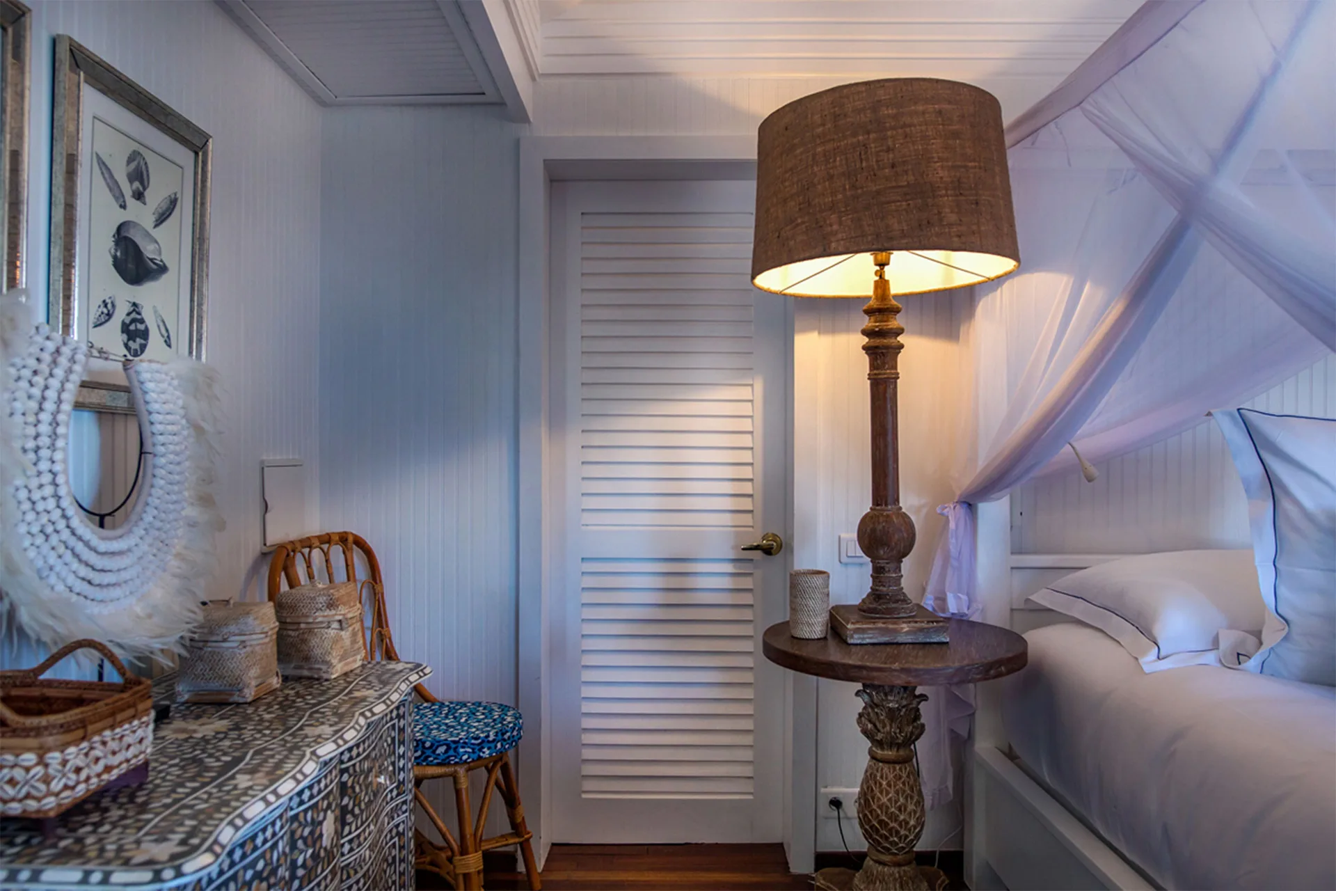 Caribbean Bungalow bedside lamp and decorative console at GYP SEA Saint Barth.