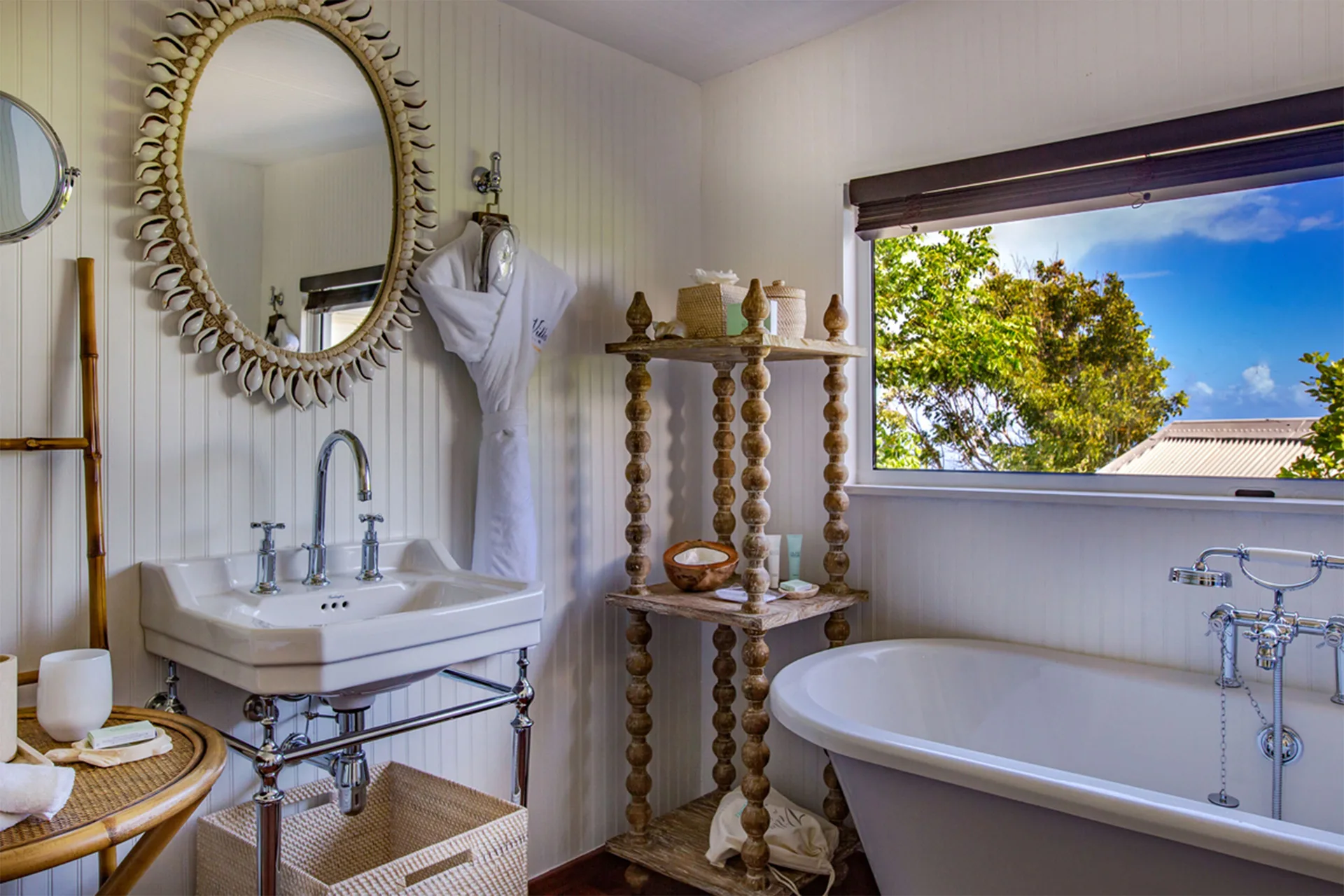 Prestige Caribbean Bungalow bathroom with tub and vanity at GYP SEA Saint Barth.