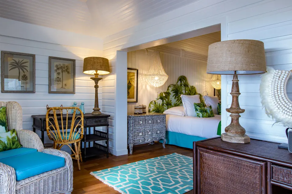 Prestige Caribbean Bungalow sitting area and king bed beyond at GYP SEA Saint Barth.