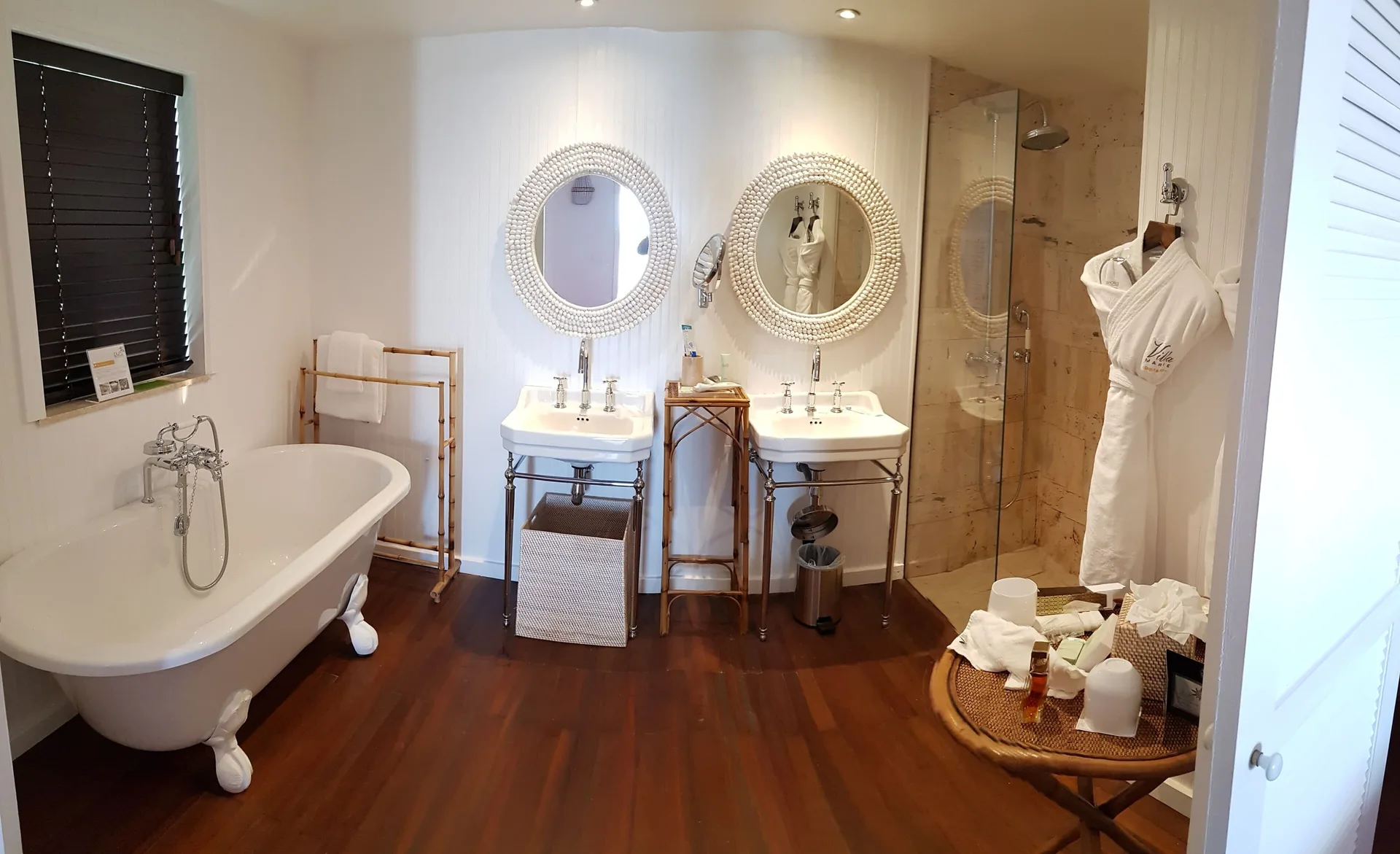 Family Suite bathroom with tub, twin sinks, and shower at GYP SEA Saint Barth.