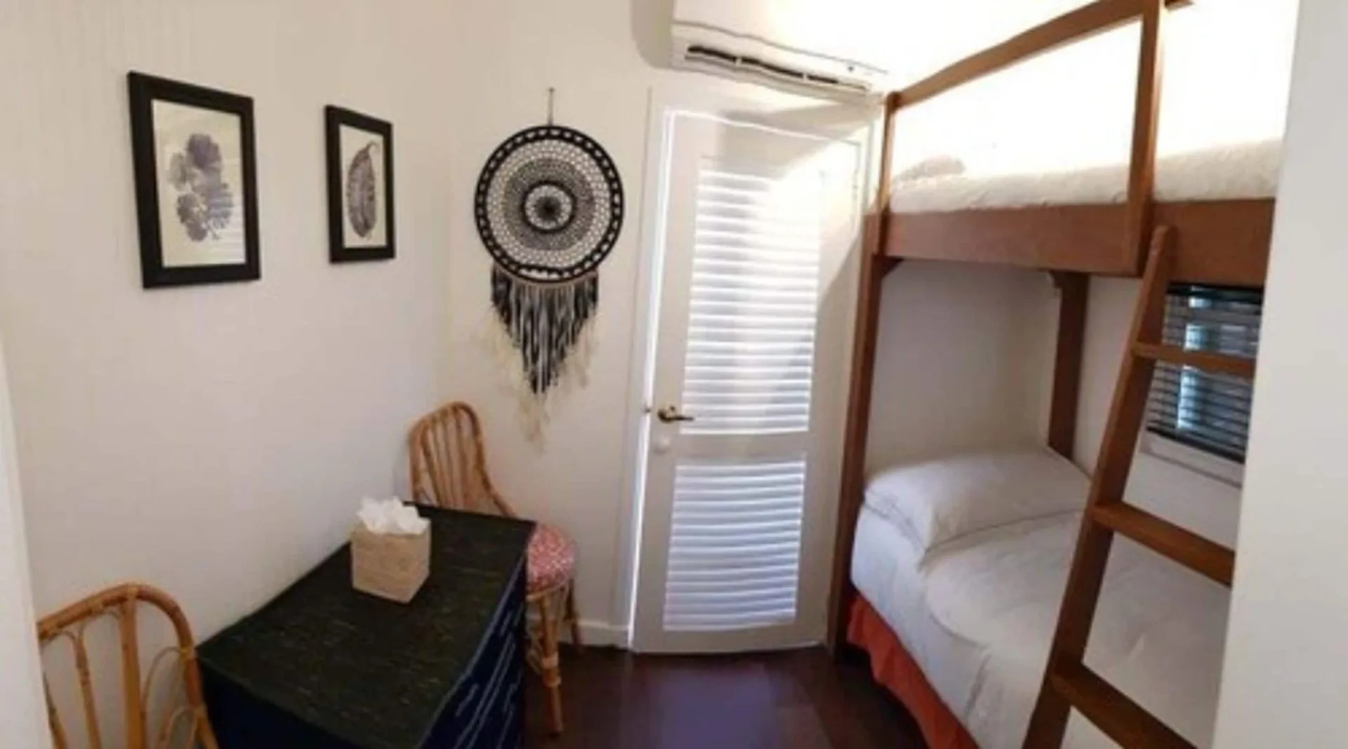 Family Suite bunk beds and small desk at GYP SEA Saint Barth.