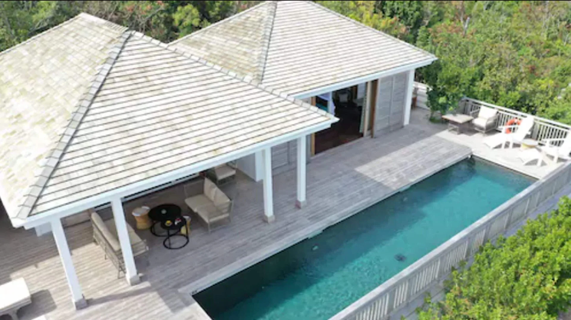 Aerial view of the villa pool and covered terrace at GYP SEA Saint Barth.