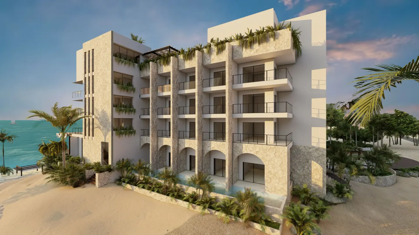 Beachfront resort building with balconies at Hacienda Tres Rios Resort, Spa & Nature Park.