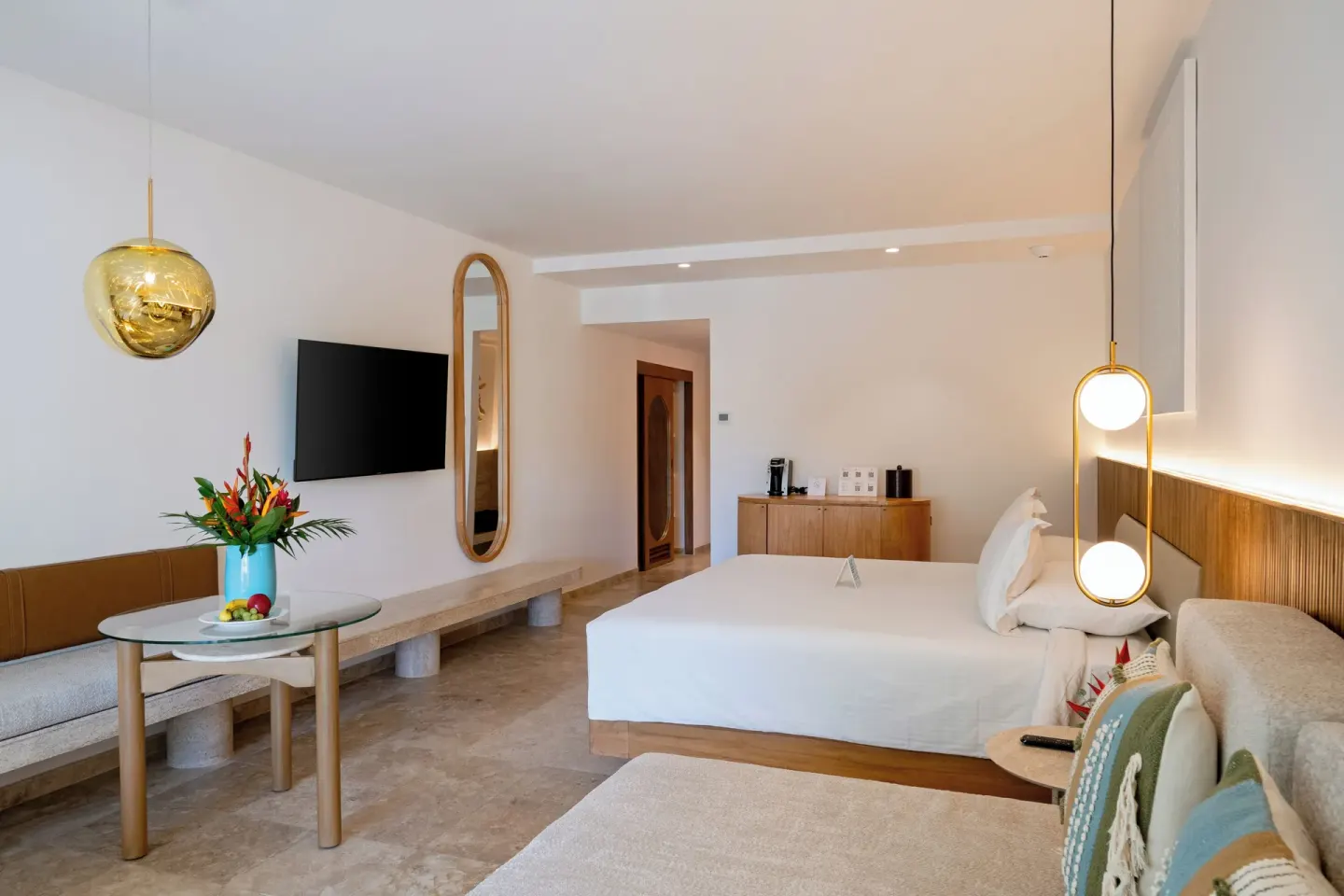 King bed guest room with coffee station at Hacienda Tres Rios Resort, Spa & Nature Park.