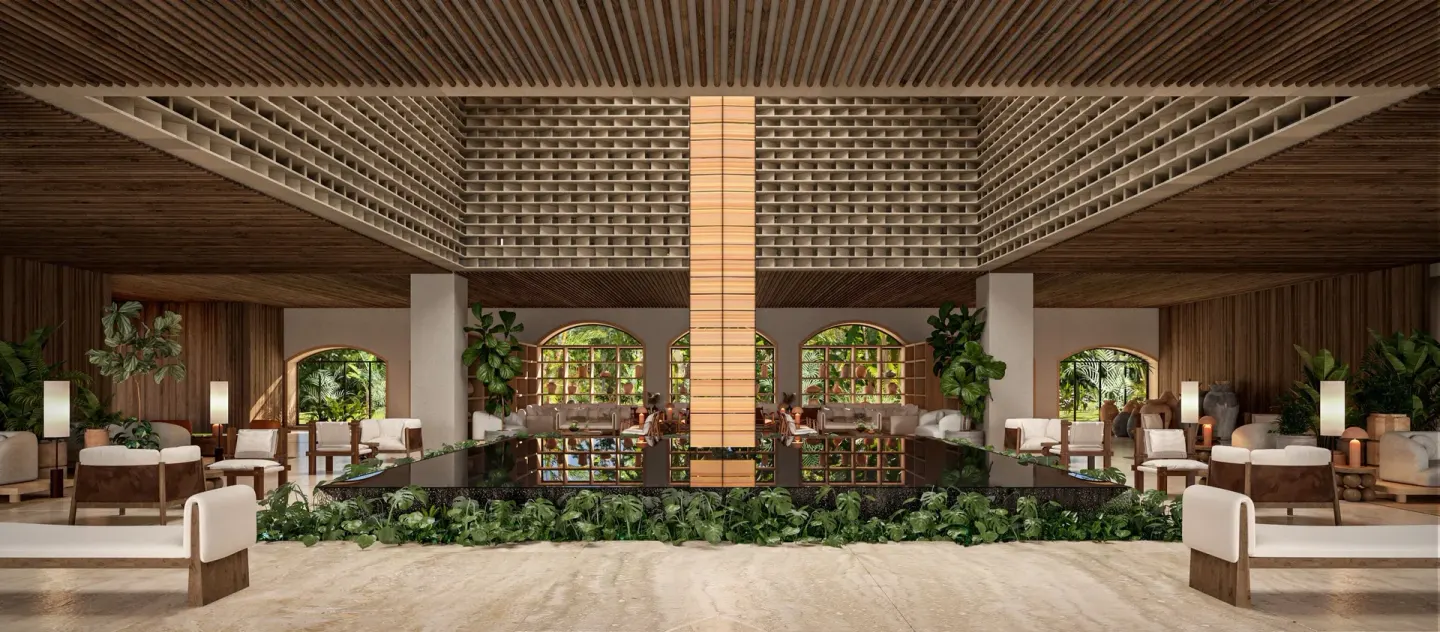 Lobby lounge with reflecting pool and greenery at Hacienda Tres Rios Resort, Spa & Nature Park.