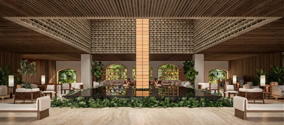 Lobby lounge with reflecting pool and greenery at Hacienda Tres Rios Resort, Spa & Nature Park.