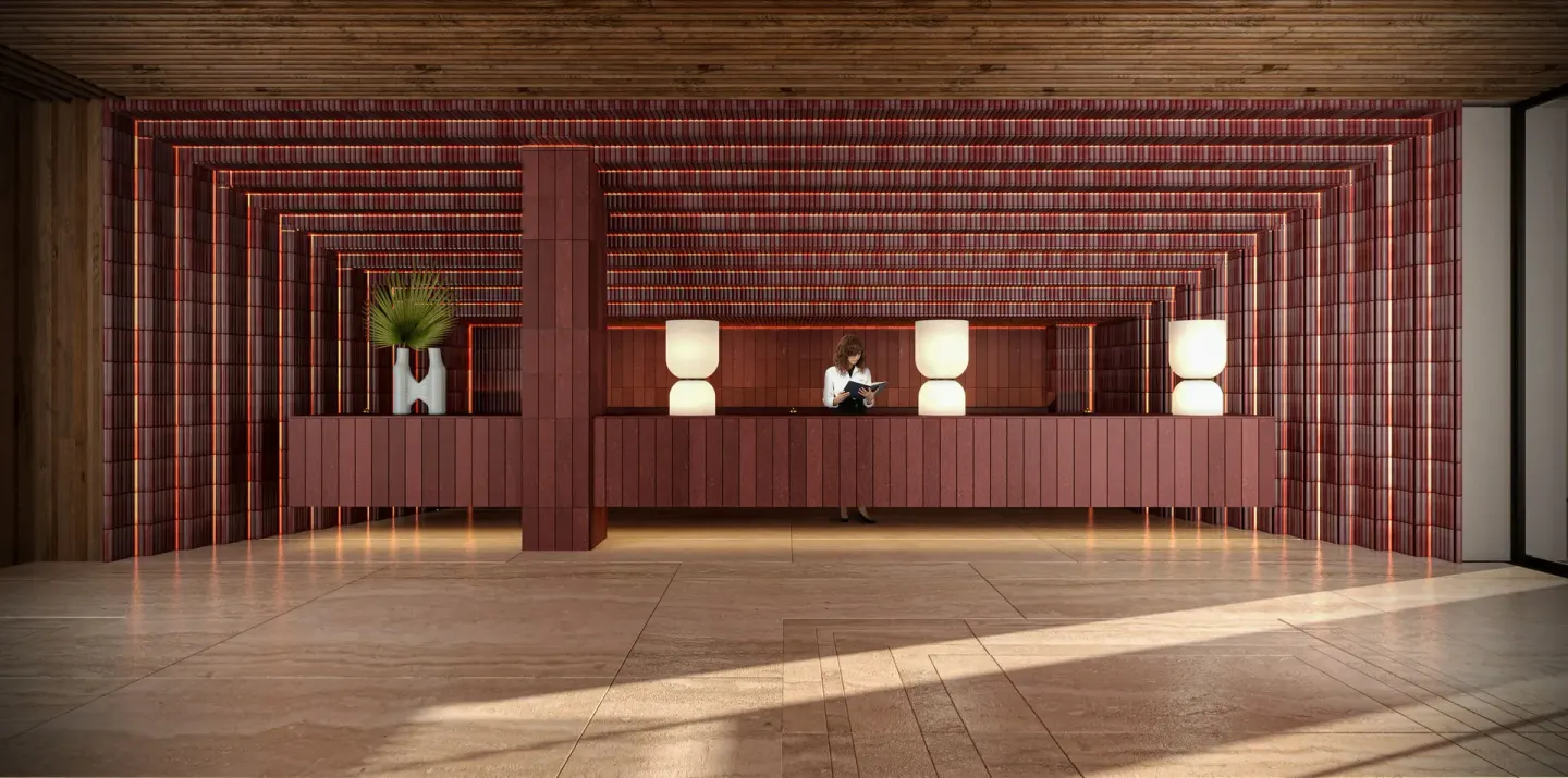 Reception desk with red wall panels at Hacienda Tres Rios Resort, Spa & Nature Park.
