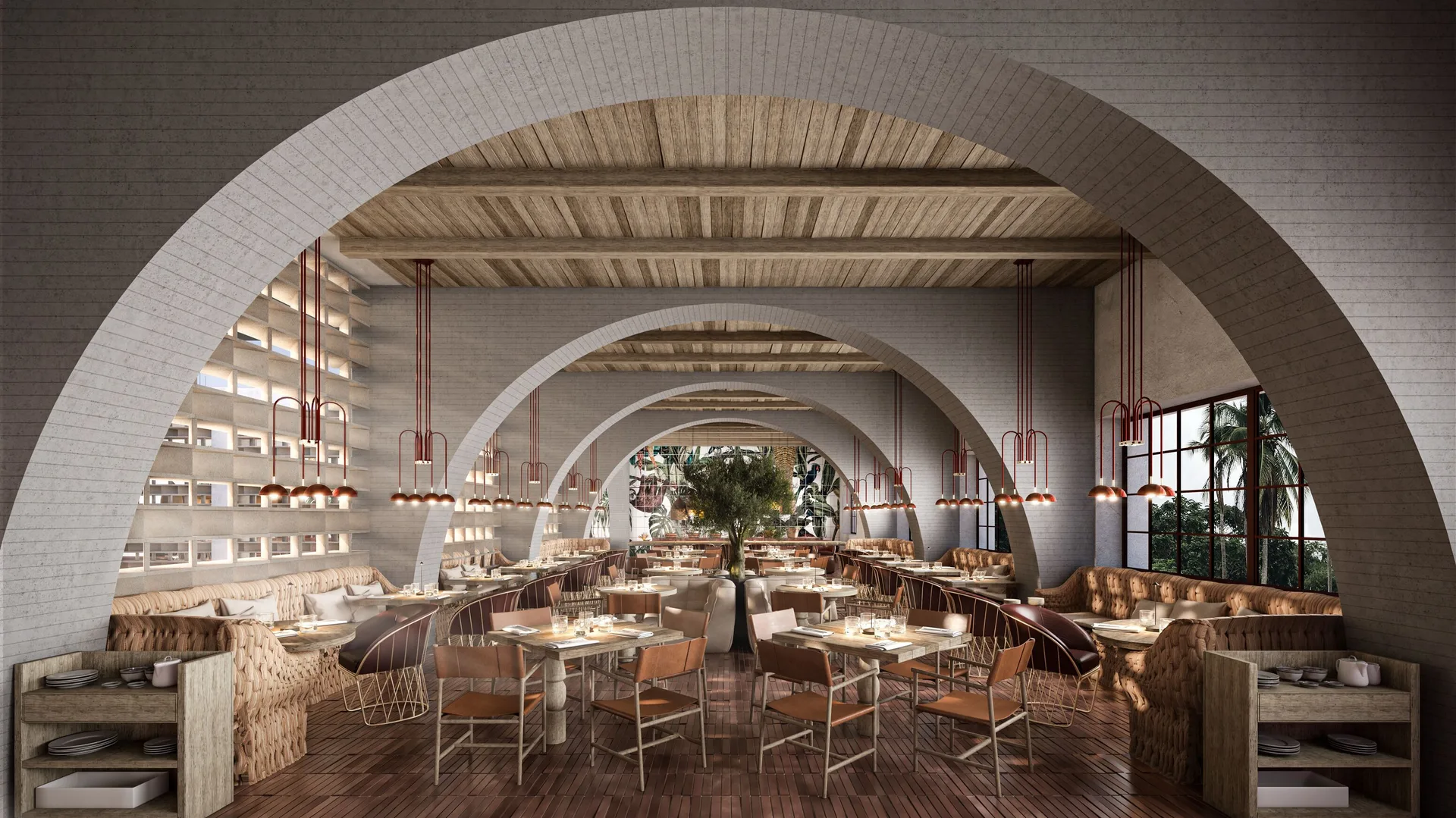 Arched restaurant with banquettes and set tables at Hacienda Tres Rios Resort, Spa & Nature Park.