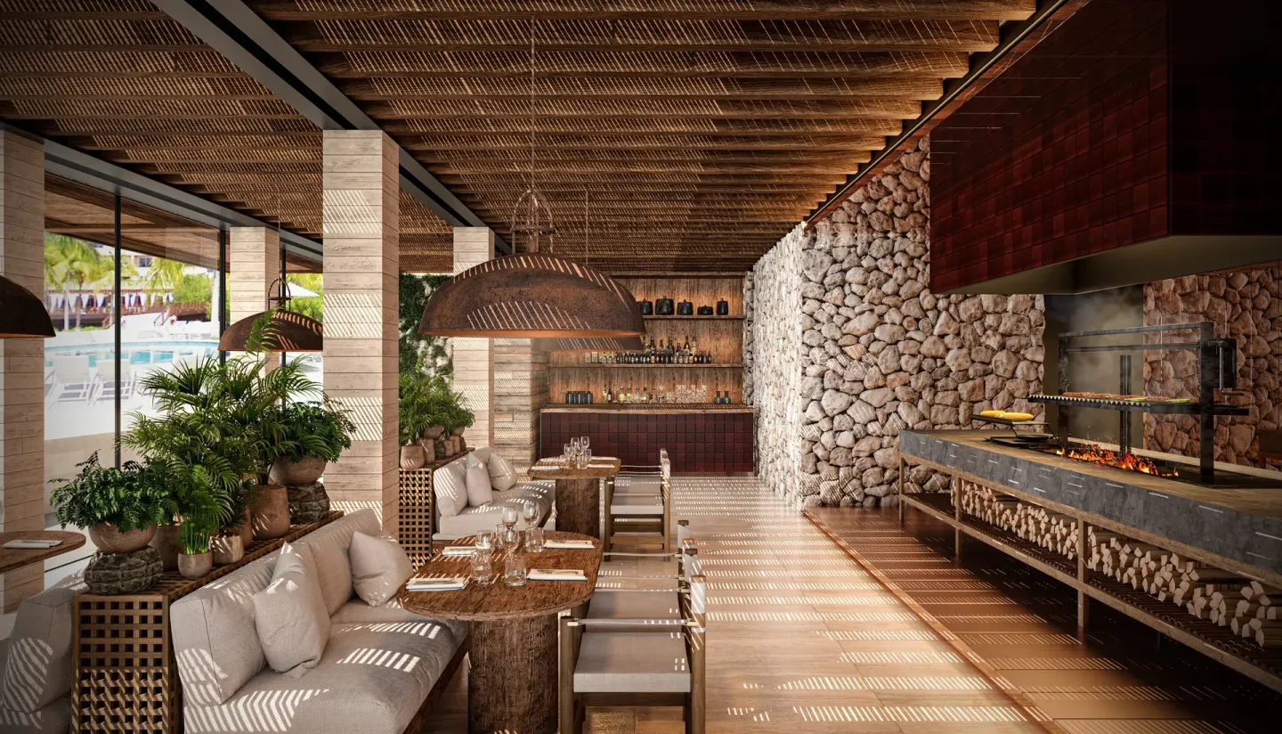 Open-air restaurant with grill and pool view at Hacienda Tres Rios Resort, Spa & Nature Park.