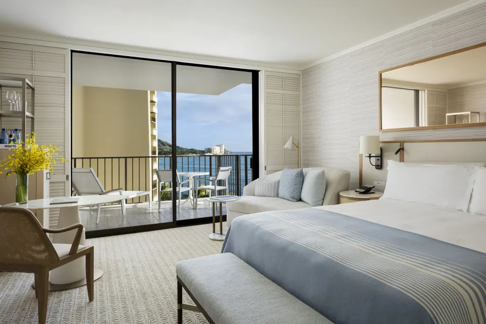 Ocean View room with king bed, balcony, and water view at Halekulani.