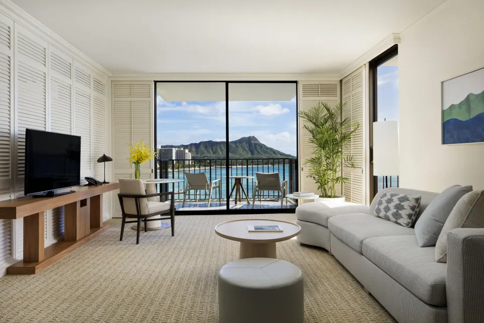 One-bedroom suite living room with Diamond Head view at Halekulani.