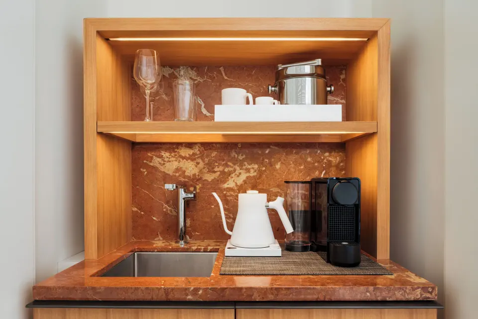 Diamond Head Suite refreshment nook with sink and coffee setup at Halekulani.