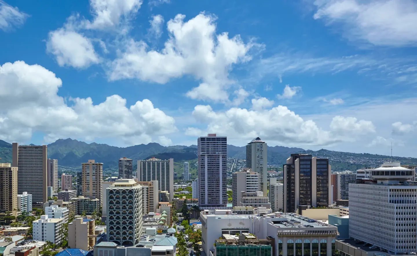 Daytime Waikiki city and mountain view from Halepuna Waikiki by Halekulani.