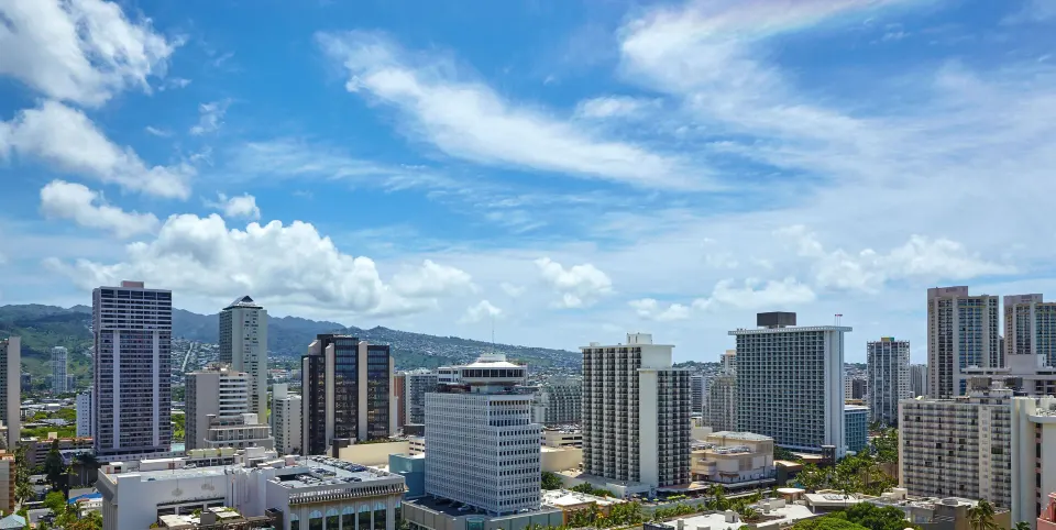 Wide Waikiki skyline and mountain view from Halepuna Waikiki by Halekulani.