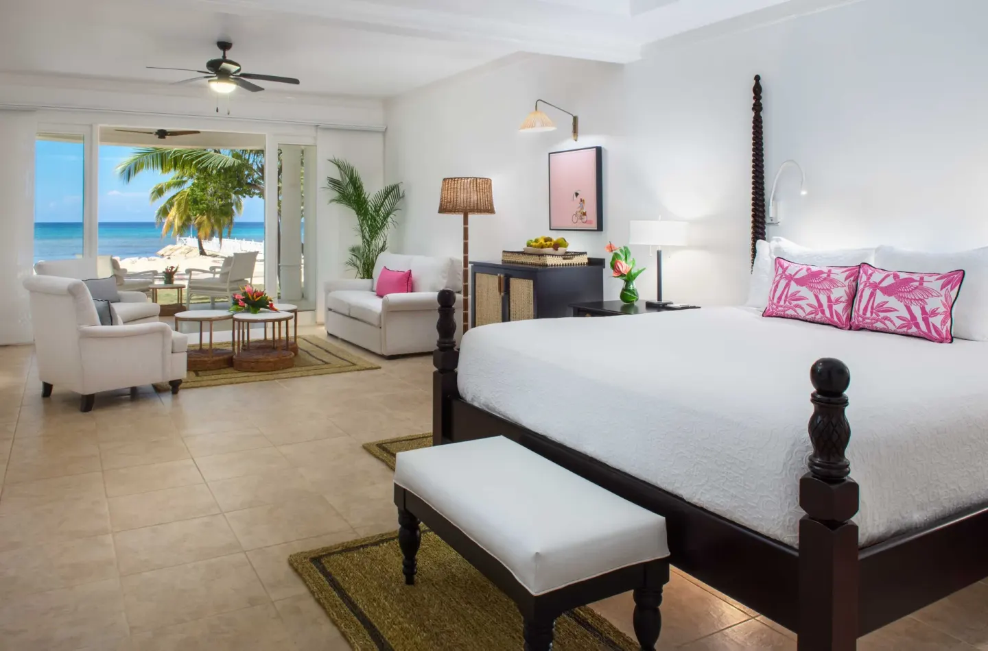 Junior Suite Ocean bedroom and sitting area with beach view at Half Moon.