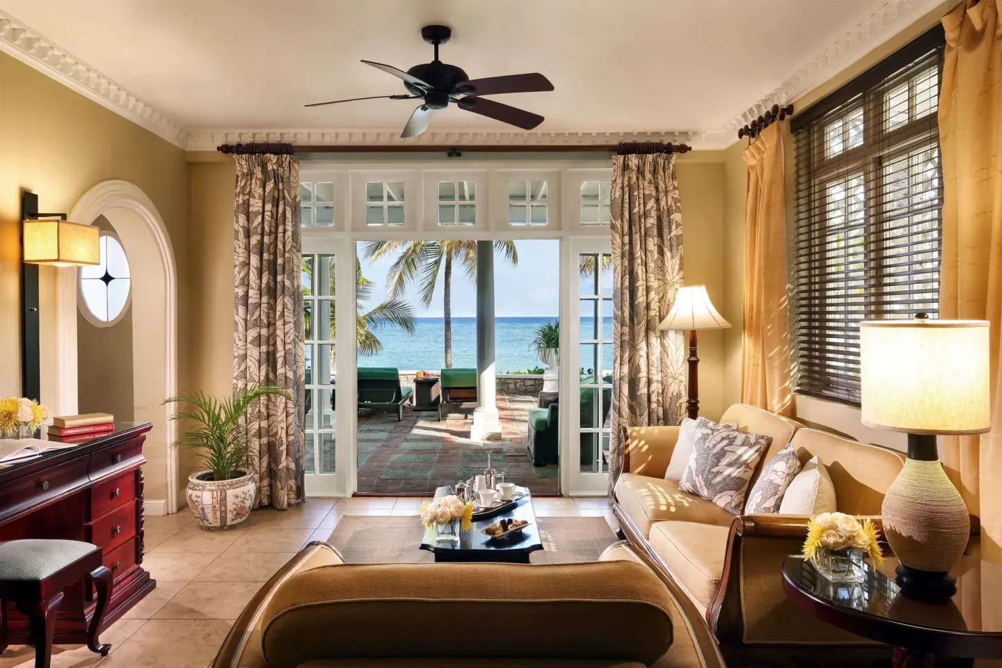 Junior Suite sitting room opening to an oceanfront terrace at Half Moon.