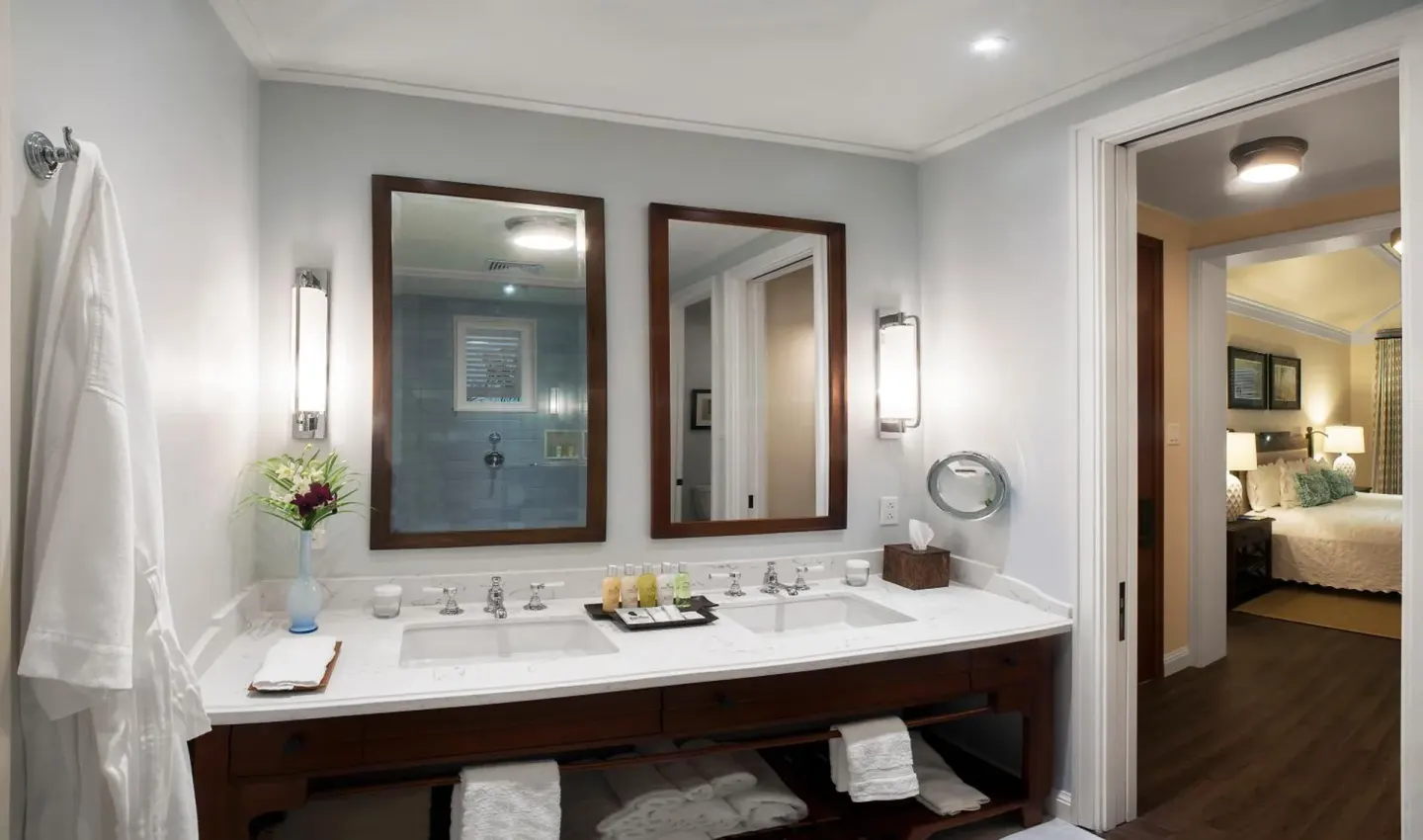 Estate Ocean bathroom vanity with double sinks and mirrors at Half Moon.