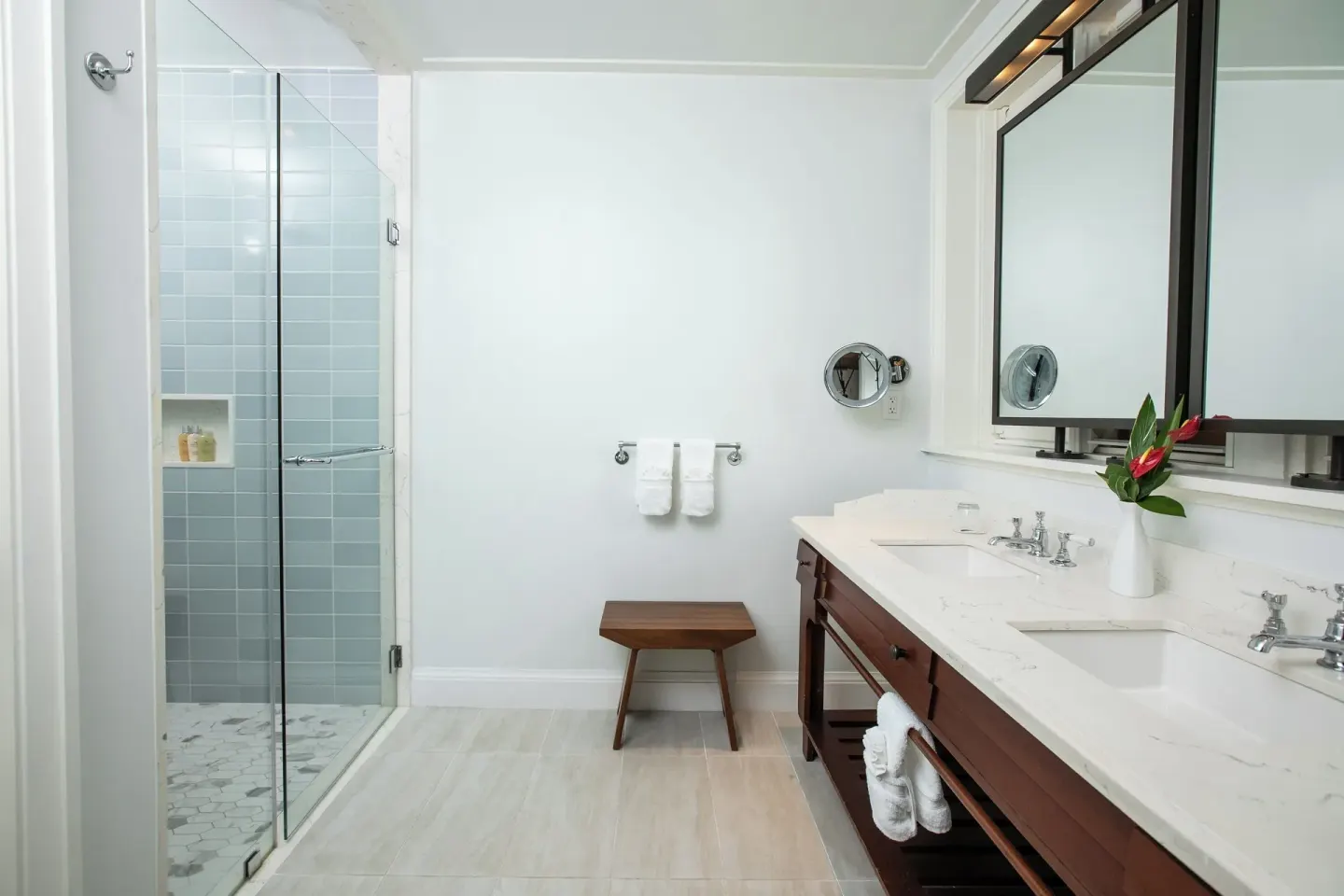 Great House Ocean bathroom with double vanity and glass shower at Half Moon.