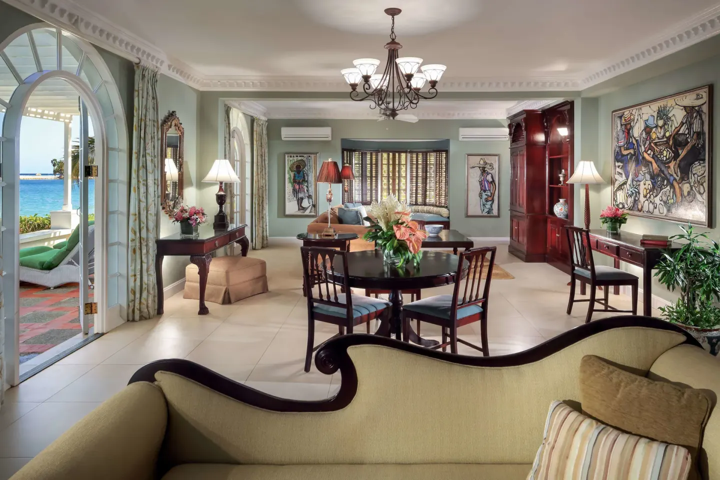 Ocean Prestige Suite living and dining area with terrace view at Half Moon.