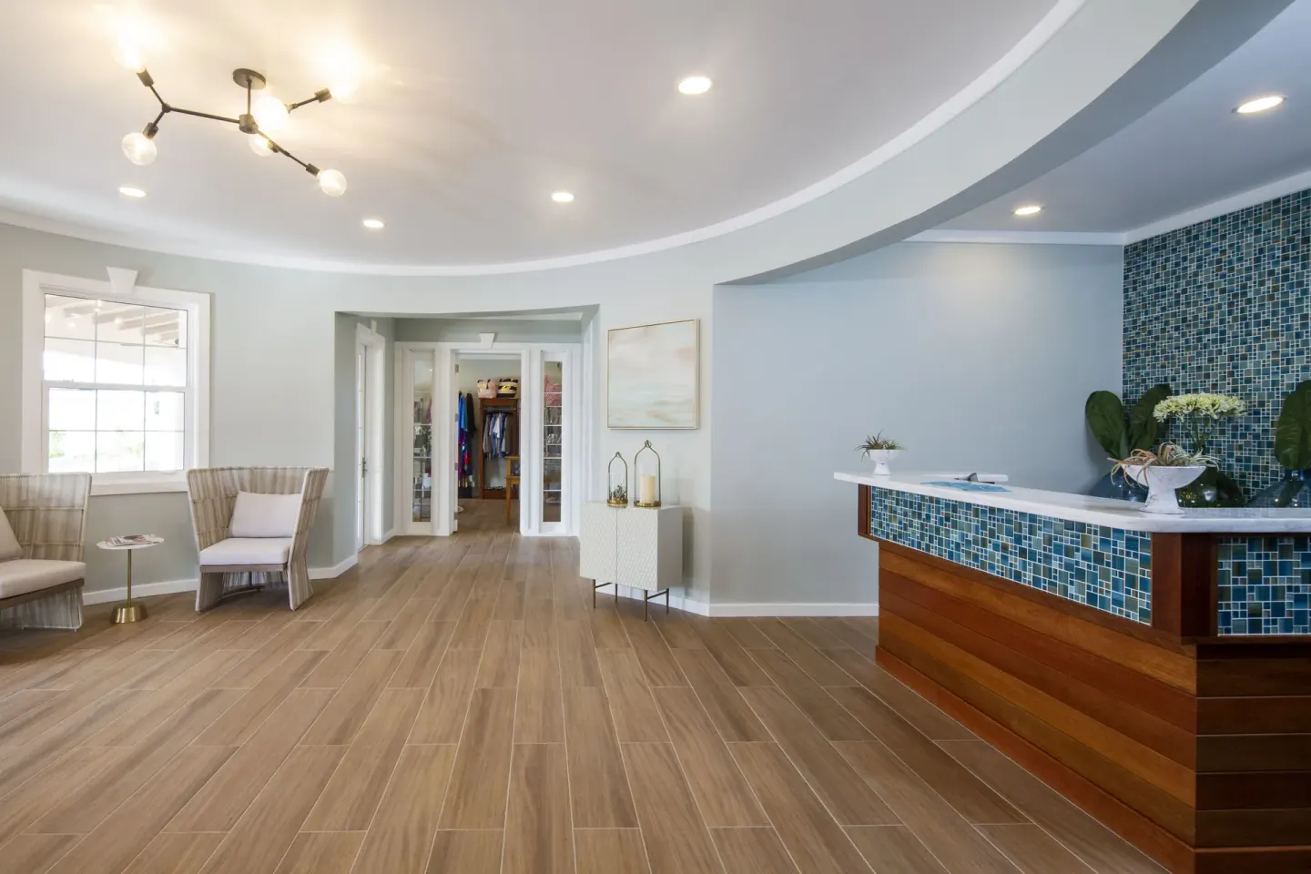 Spa reception with tiled desk and lounge chairs at Hammock Cove Antigua.