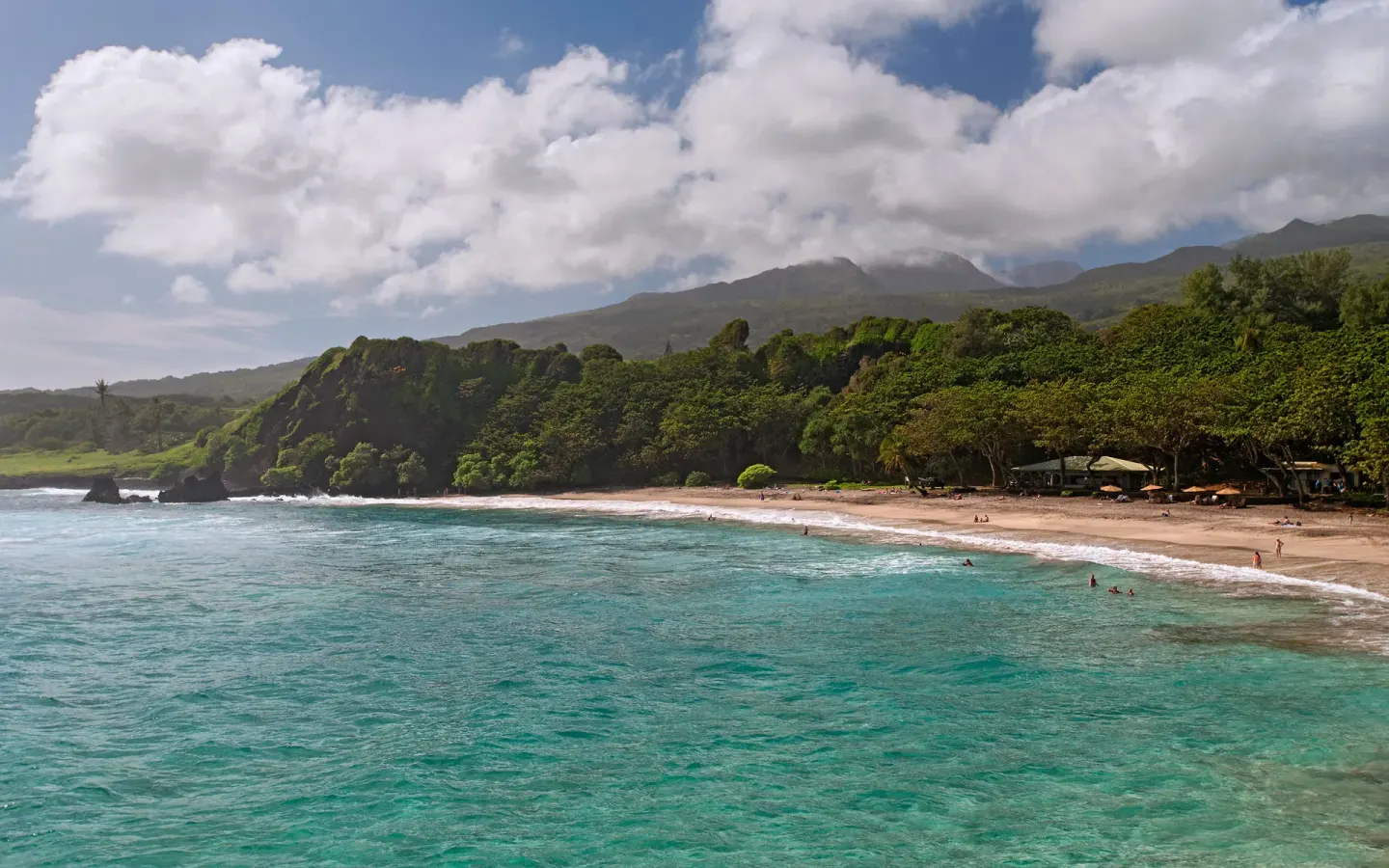 Hamoa Beach coastline with turquoise water near Hana-Maui Resort.