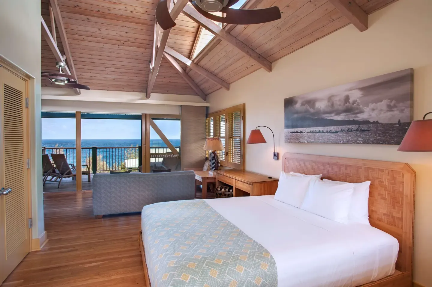 Ocean View Bungalow bedroom with king bed and lanai at Hana-Maui Resort.