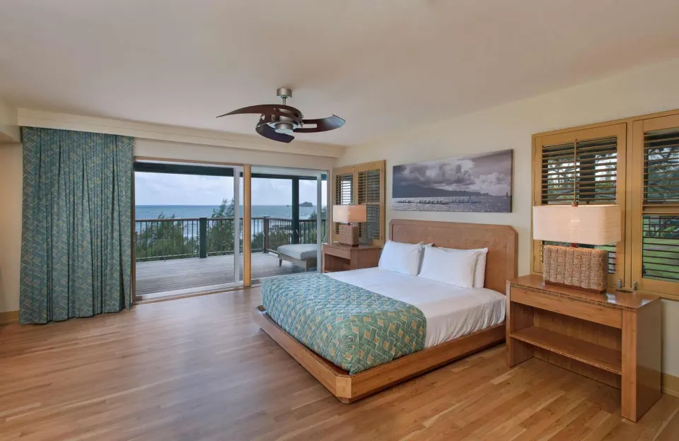 Oceanfront bungalow with king bed and lanai facing the water at Hana-Maui Resort.