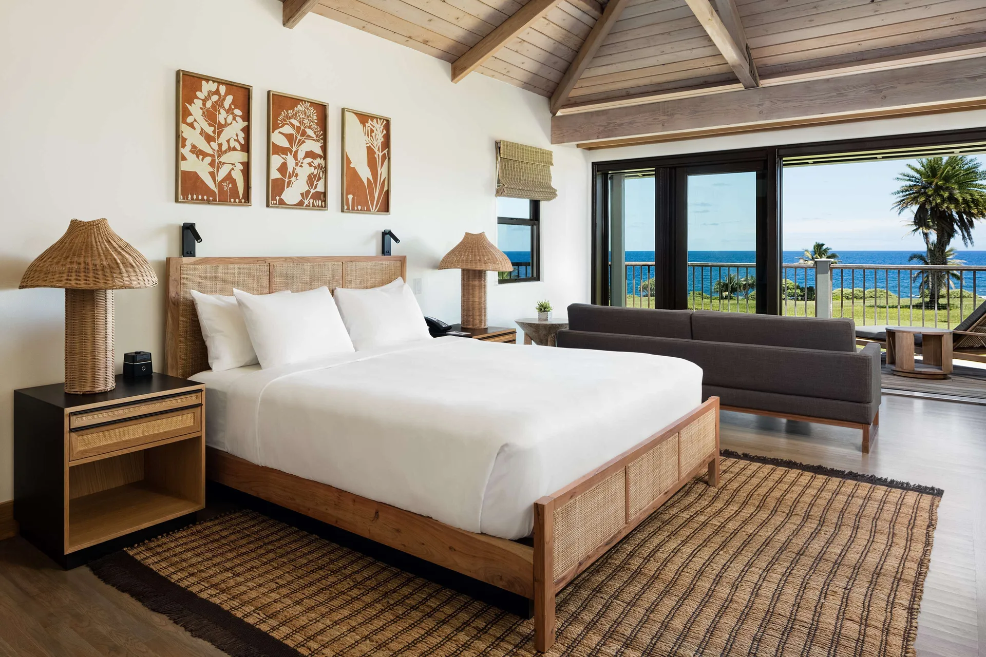Oceanfront Deluxe Bungalow bedroom with king bed and ocean view at Hana-Maui Resort.