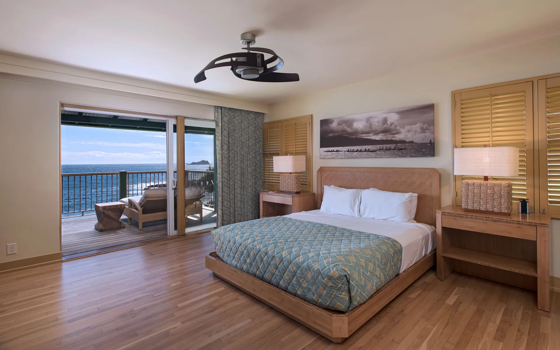 Premier Suite Oceanfront king bedroom with lanai and ocean view at Hana-Maui Resort.