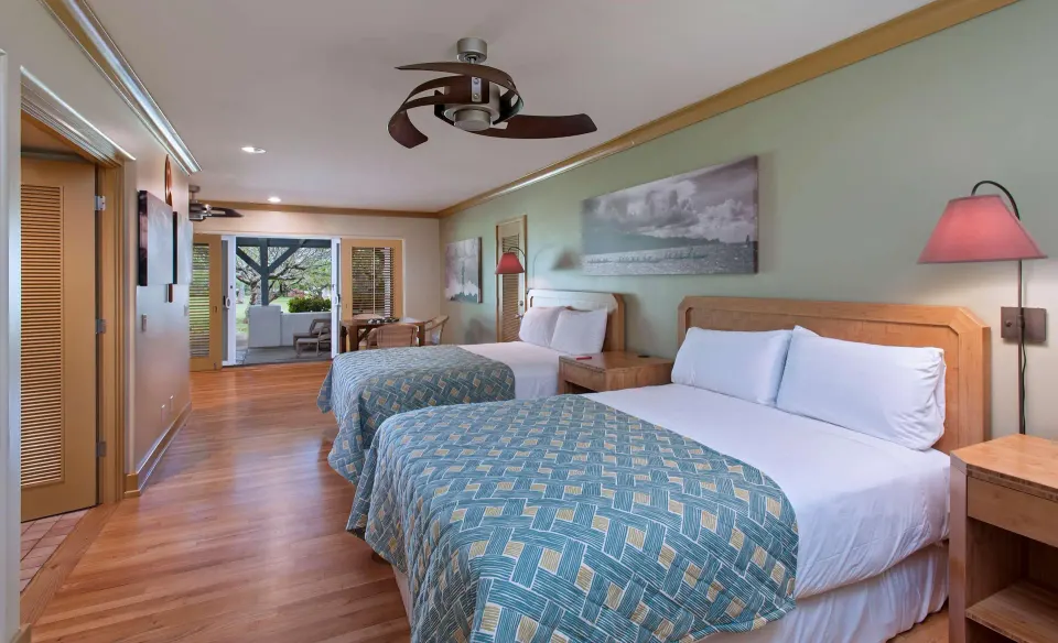 Room Garden View with two beds and patio doors at Hana-Maui Resort.