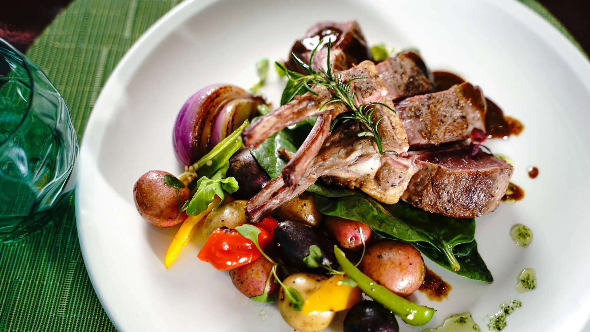 Plated lamb with vegetables served at Harbor Club St. Lucia.