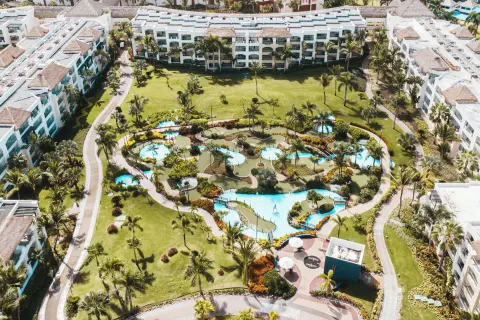 Aerial view of garden pools and guest buildings at Hard Rock Hotel & Casino Punta Cana.
