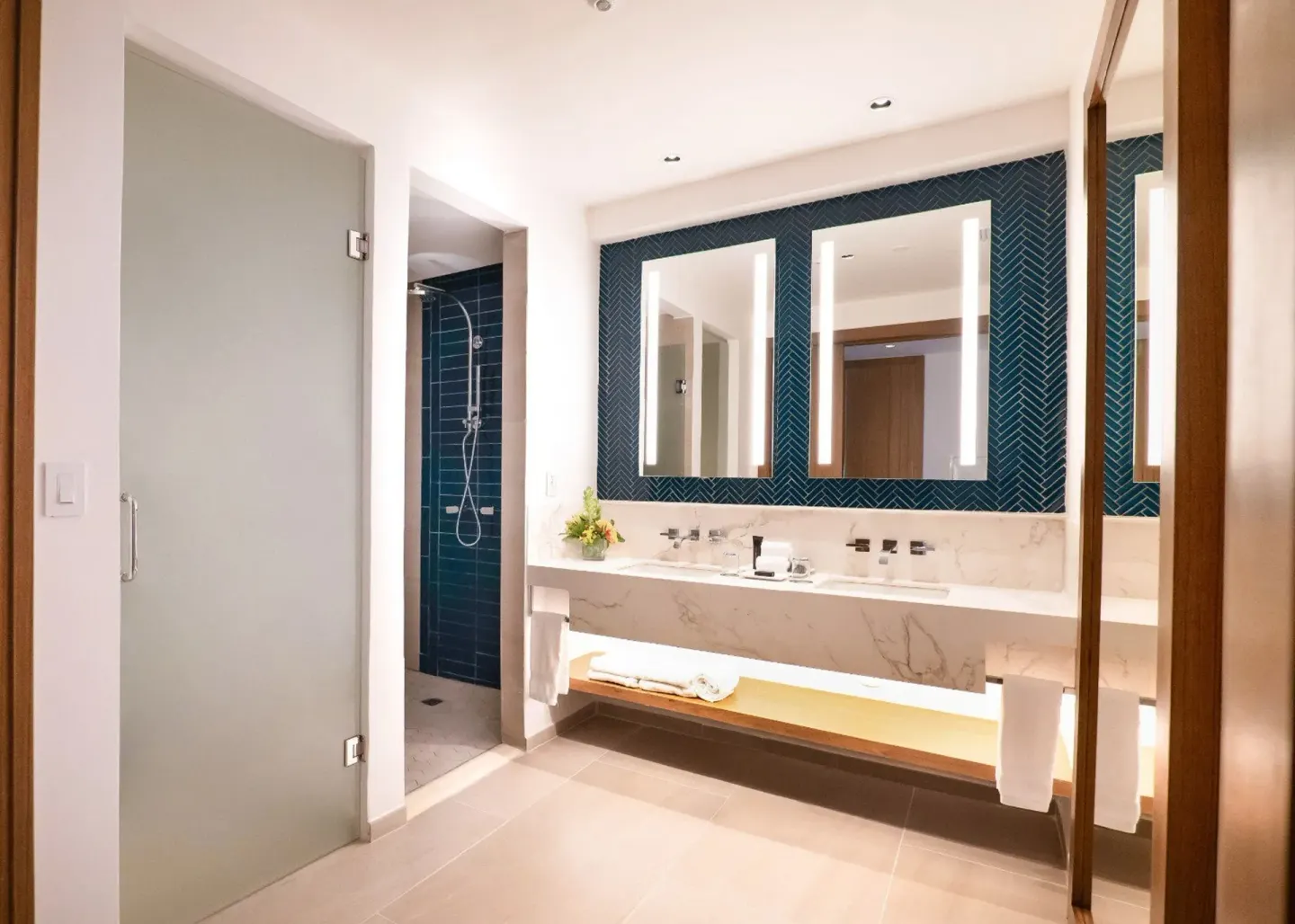 Double vanity and walk-in shower in a bathroom at Hard Rock Hotel & Casino Punta Cana.