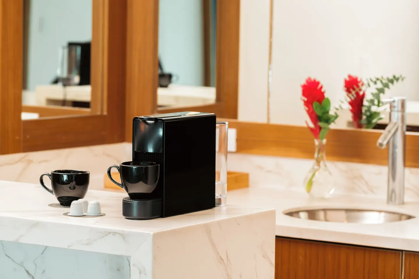 Coffee maker and sink on a marble counter at Hard Rock Hotel & Casino Punta Cana.
