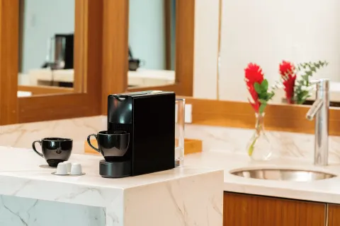 Coffee maker and sink on a marble counter at Hard Rock Hotel & Casino Punta Cana.