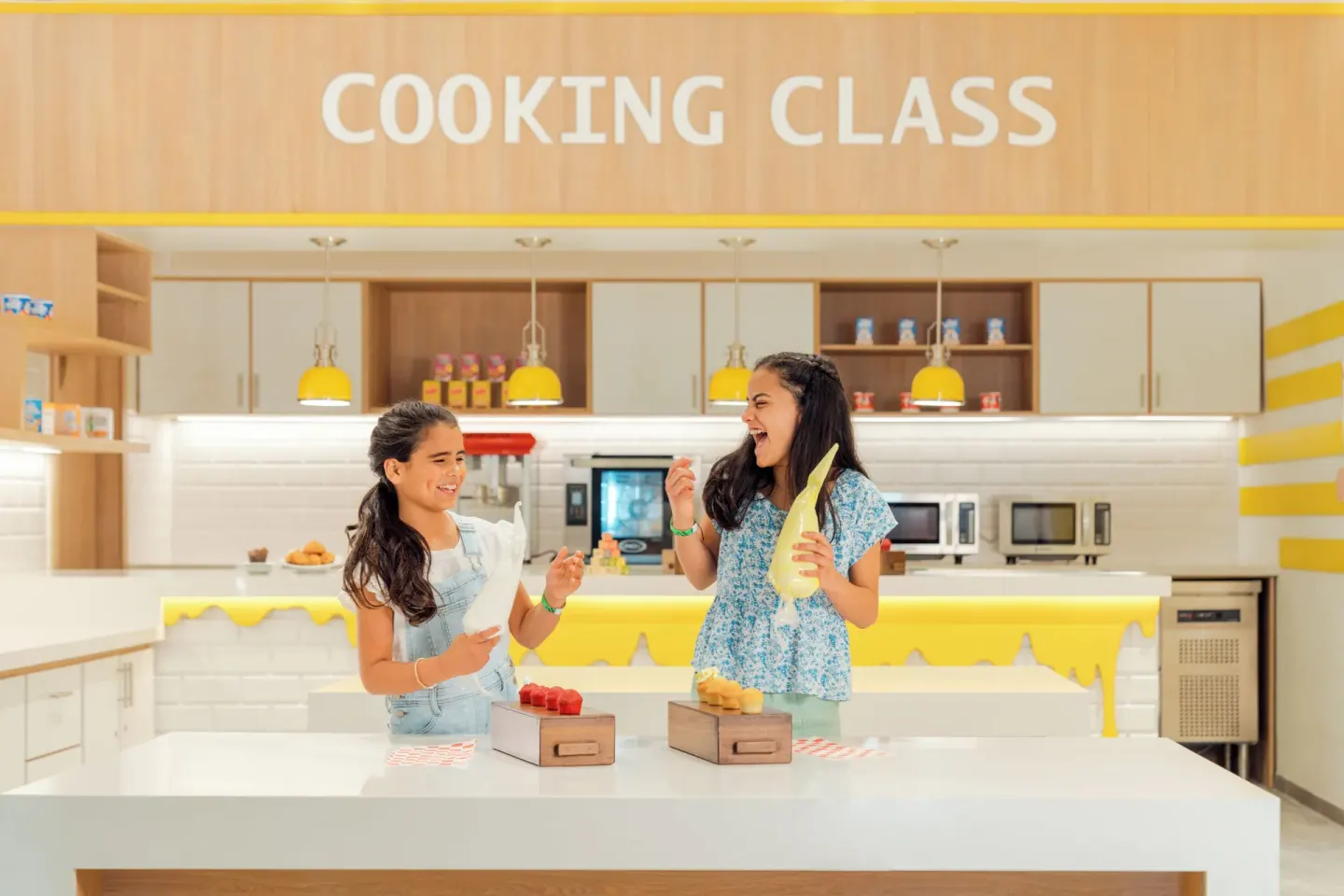 Children prepare food in a cooking class at Hard Rock Hotel & Casino Punta Cana.