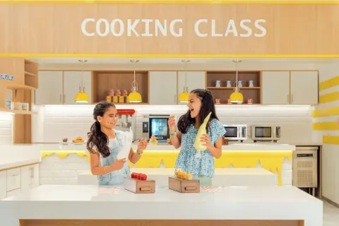 Children prepare food in a cooking class at Hard Rock Hotel & Casino Punta Cana.