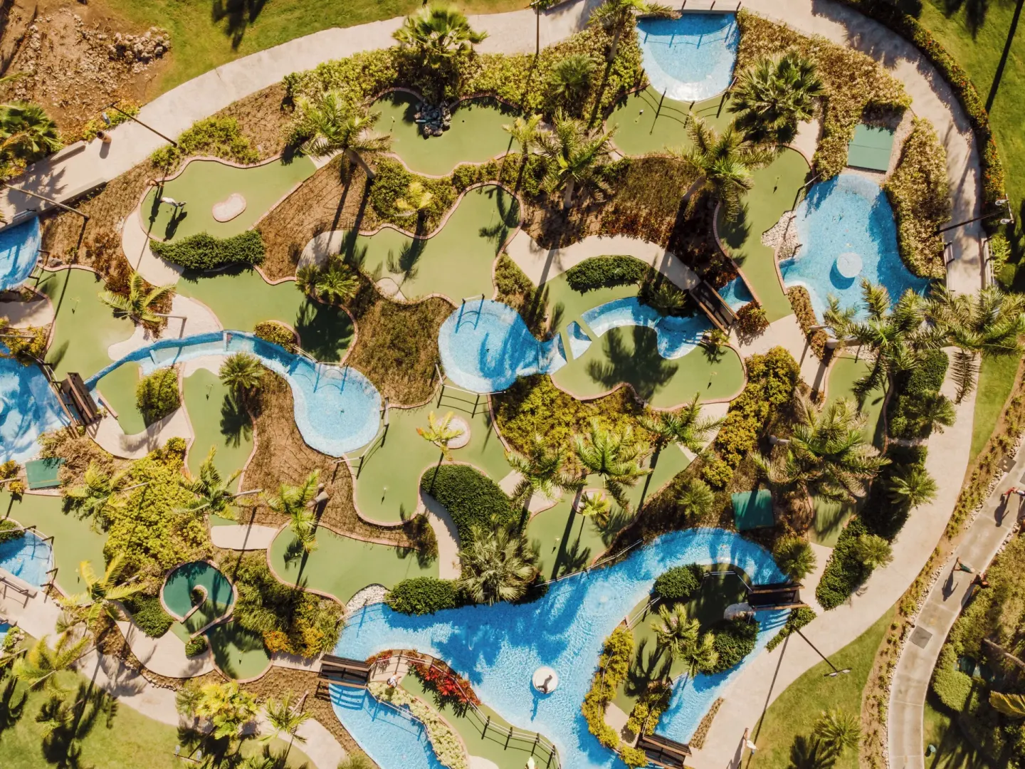 Aerial view of mini golf greens and pools at Hard Rock Hotel & Casino Punta Cana.