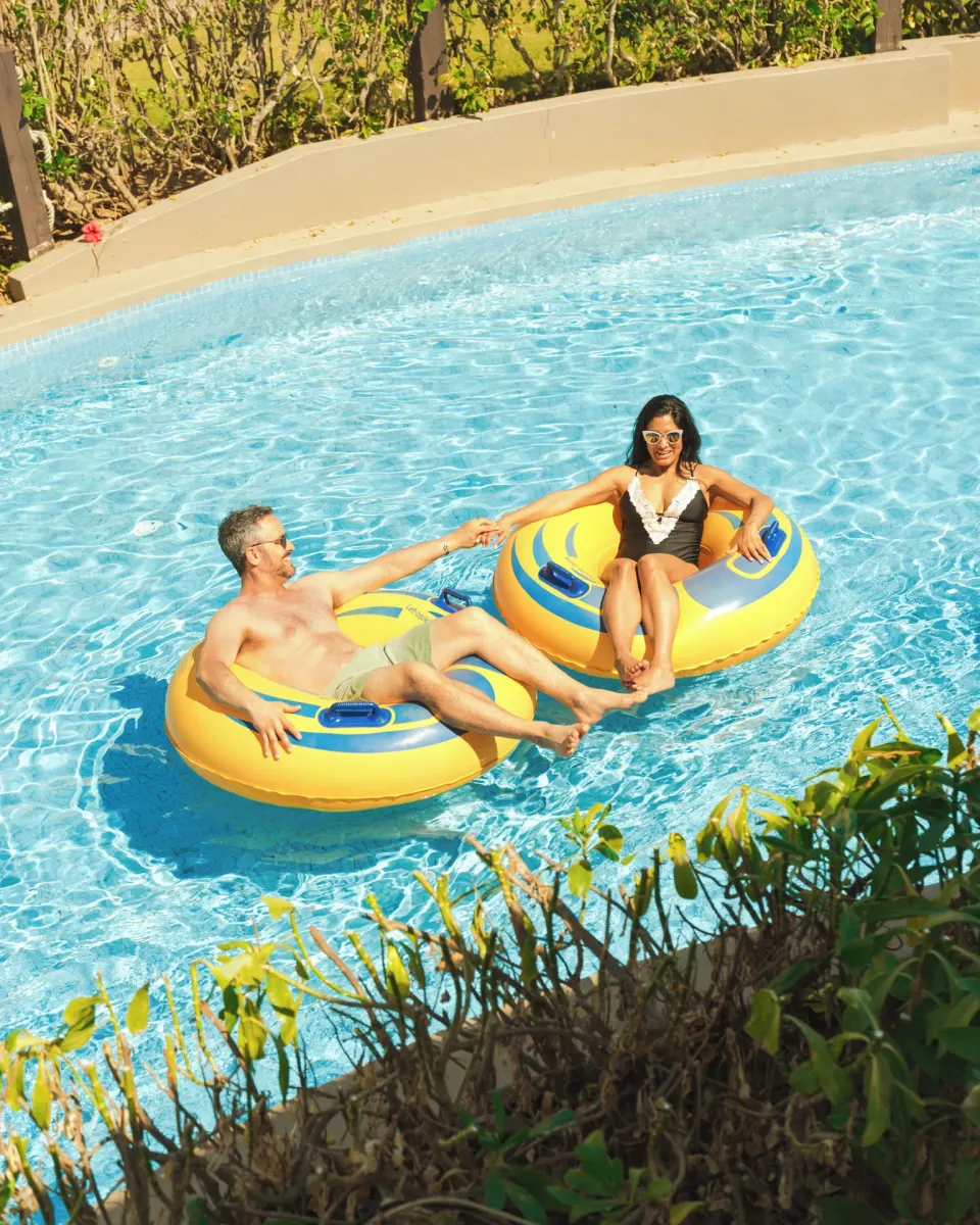 Guests float on inner tubes in a pool at Hard Rock Hotel & Casino Punta Cana.
